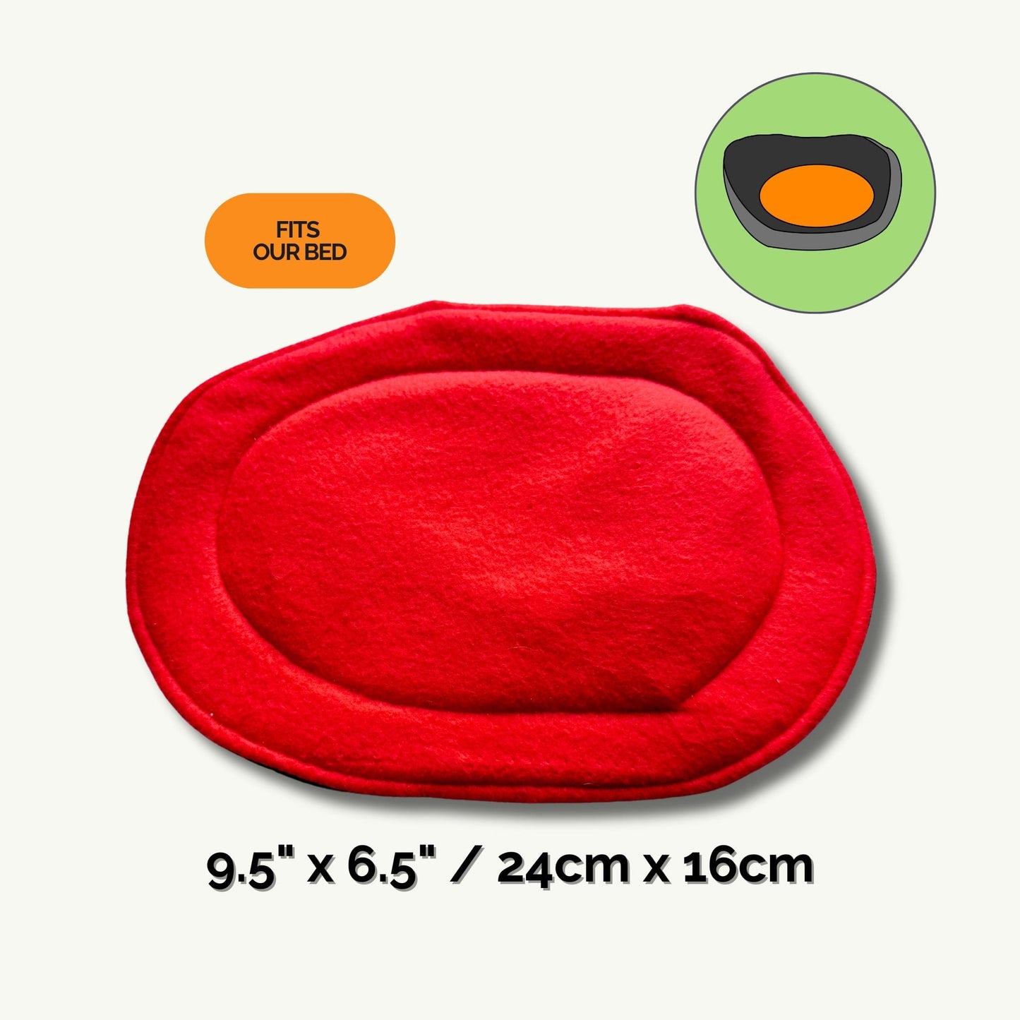 A gothic-glam pee pad, enchanting in deep crimson velvet with an oval silhouette, lies invitingly with pillowy softness—just right for pampered little familiars. An enchanted illustration floats above, showing how perfectly this pad nestles into a grander bed, conjuring cozy protection. Elegant script below whispers the size: 9.5 by 6.5 inches (24 by 16 centimeters). A bewitching label proclaims: “Fits our bed.” Transform your nightly cleaning ritual into pure ghoulish delight!.