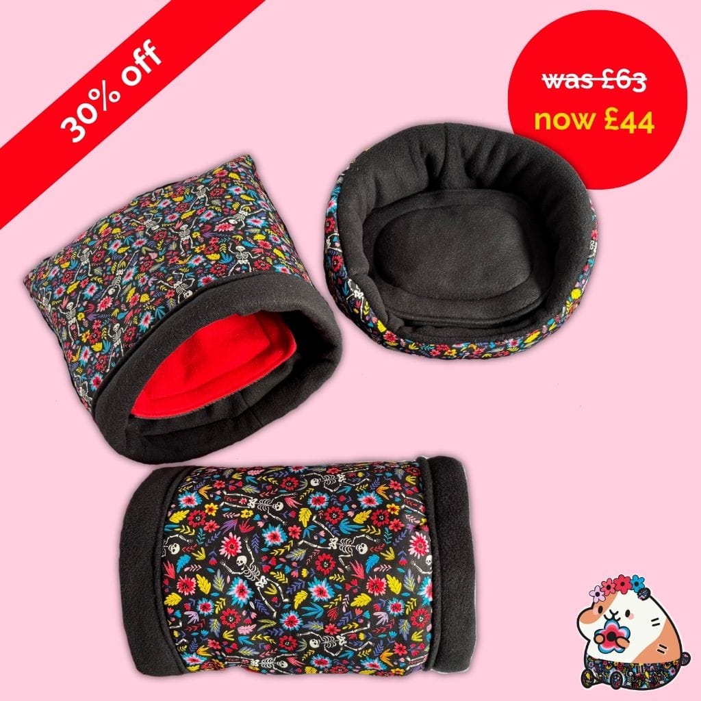 Blooms & Bones Starter Set haunts a candy-pink stage—bathed in glamour, 30% off, gothic-chic critter lurking in the shadows.