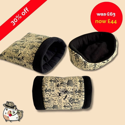 Gothic-glam Tombstone Tango set: three plush, coffin-chic pet beds with black velvet interiors and whimsical beige exteriors. Save 30%! A dapper explorer cat peeks from the corner.