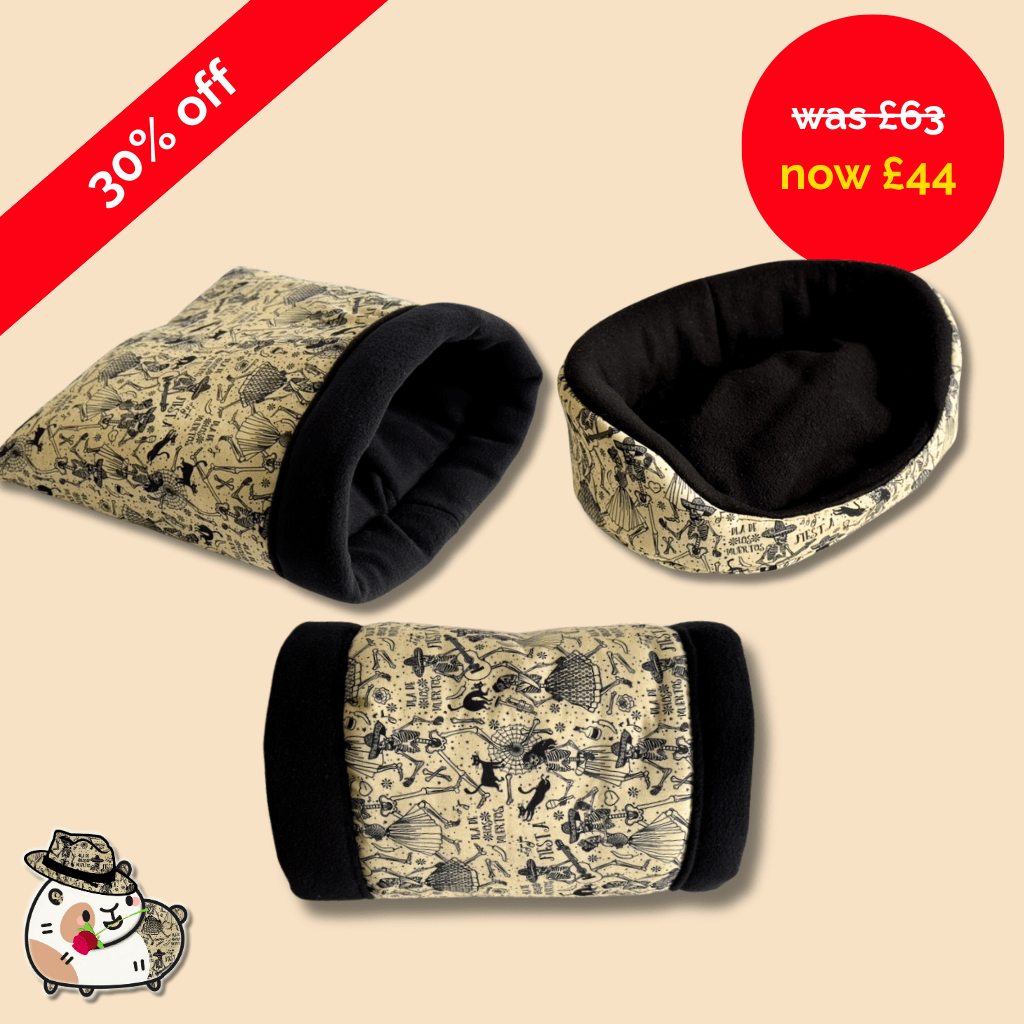 The Tombstone Tango Set haunts in black and beige adventure patterns; red sale tag, spooky-cute safari cat greets from the corner.