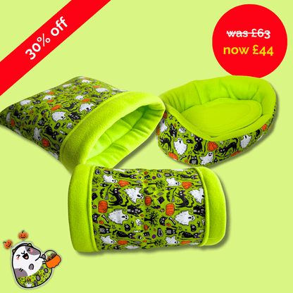 Ghoul-glam green fleece bedding, haunted by adorable ghosts and spooky-cute motifs, floats on mint. 30% off—£63 now £44!.