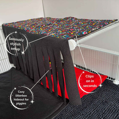 Enchant your pet’s lair with the Blooms & Bones 2x1 Fleece Forest—black fringe curtains, red liner, and whimsical patterned fleece.