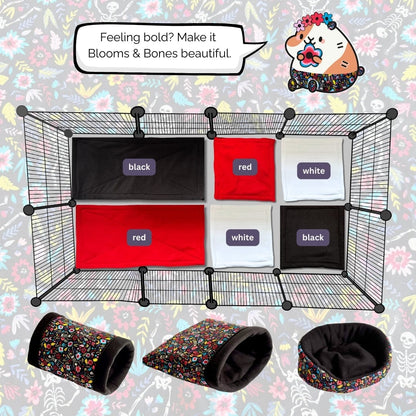 A guinea pig paradise fit for gothic royalty! The cage is elegantly lined with Modular Fleece Liner and Pee Pad, swirling together in haunting shades of black, crimson red, and ghostly white. Beneath lies a matching set: a floral-patterned tunnel, snuggly cuddle cup, and cozy sack—all adorned with dark roses and enchanting bone motifs. A charming cartoon guinea pig with bewitching eyes pipes up: “Feeling bold? Make it Blooms & Bones beautiful!”.