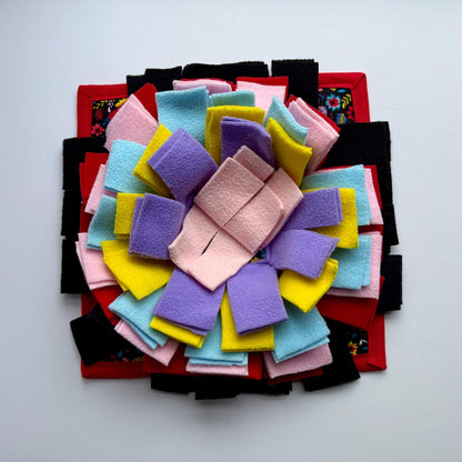 Blooms & Bones Snuffle Mat: pastel petals haunt a black and crimson base, creating an enchanting foraging quest for your piggy.