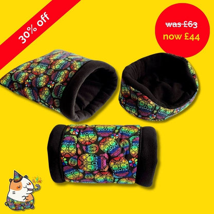 Whimsical sugar skull pet beds—bright fleece and spooky charm—pop on yellow. Adorable cartoon hamster haunts the bottom left.