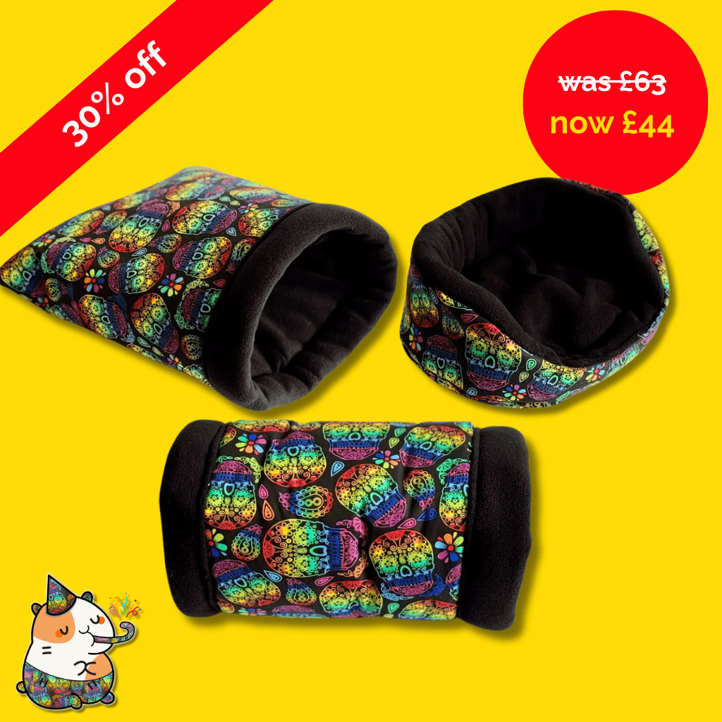 Three vibrant fleece tunnels from the Frightful Fiesta set gleam atop yellow—festive savings lurk! Cartoon hamster haunts the corner.
