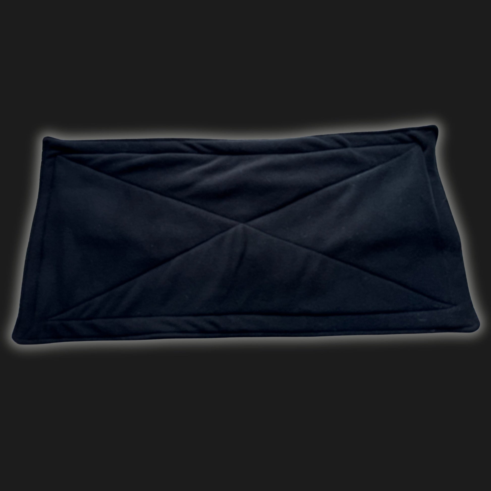 Enchant your pet’s lair with our Modular Fleece Liner & Pee Pad in midnight black—soft, plush padding stitched with gothic X marks, like secret runes woven on a velvety spell book. Shown against a moody charcoal background, this waterproof wonder is reusable and bewitchingly cozy—perfect as a mystic-cute cage liner or potty pad for your small familiars.