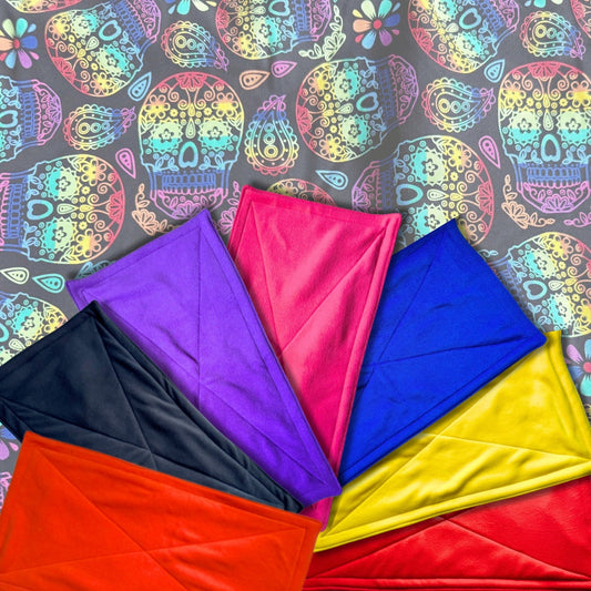 Seven hauntingly adorable Frightful Fiesta Pee Pads unfurl in a dramatic fan, each one bursting with enchanting patterns of sugar skulls, moonlit florals, and swirling paisleys in bold, spellbinding hues. Layered atop a vibrant gothic-chic backdrop alive with festive Day of the Dead motifs, these plush pads promise cozy comfort and wickedly easy cleanup—turning your small pet’s lair into a glamorous haunt for guinea pigs with a flair for the playful and the mysterious.
