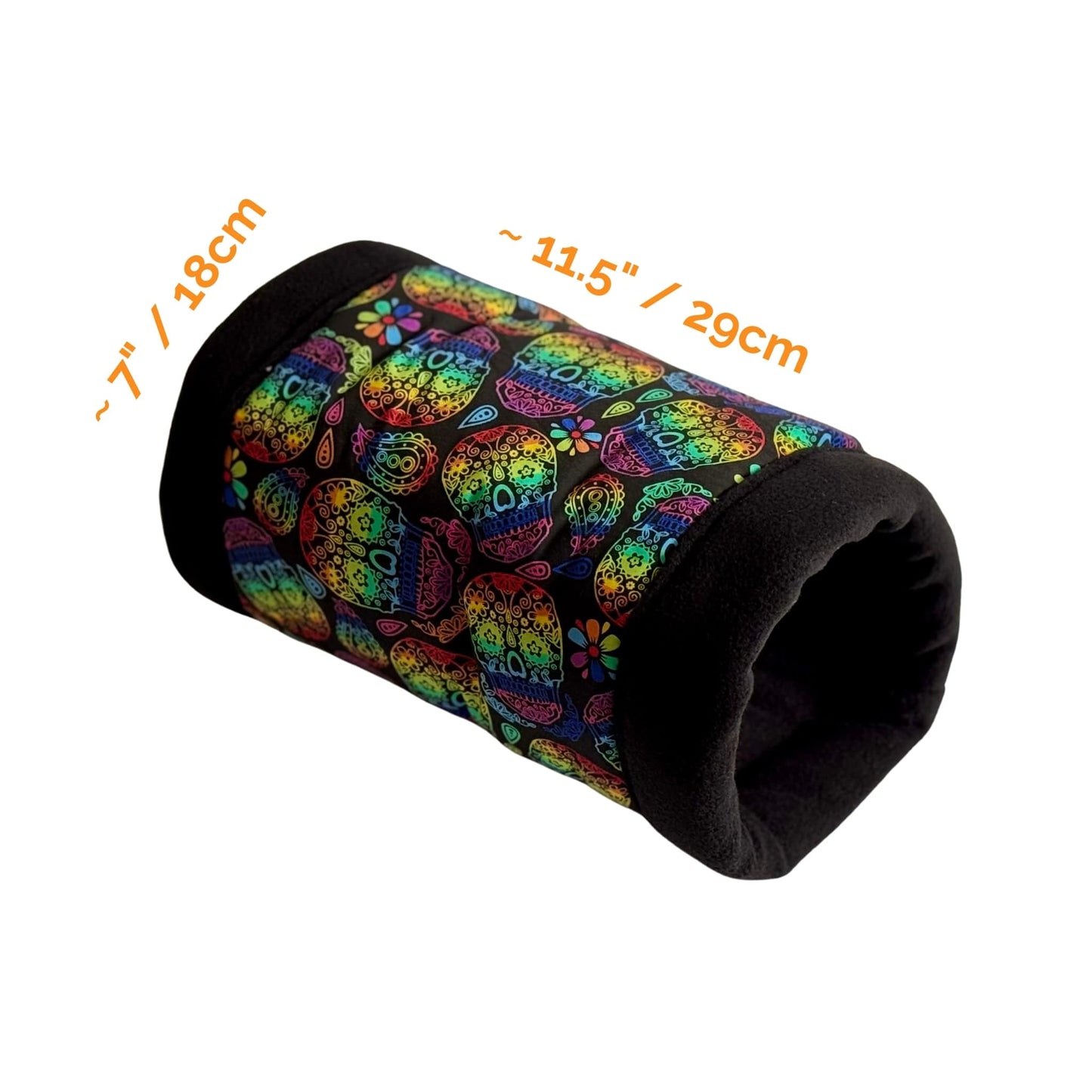 The Frightful Fiesta Snuggle Tunnel casts a spell of gothic-glam charm with its midnight-black interior and a dazzling parade of rainbow sugar skulls, inspired by Frightful Fiesta. This whimsically spooky hideaway measures about 7 inches (18 cm) wide and 11.5 inches (29 cm) long—perfectly sized for guinea pigs and other tiny familiars. Shown on a white background, it invites your small pet to snuggle up in style beneath its hauntingly festive pattern.