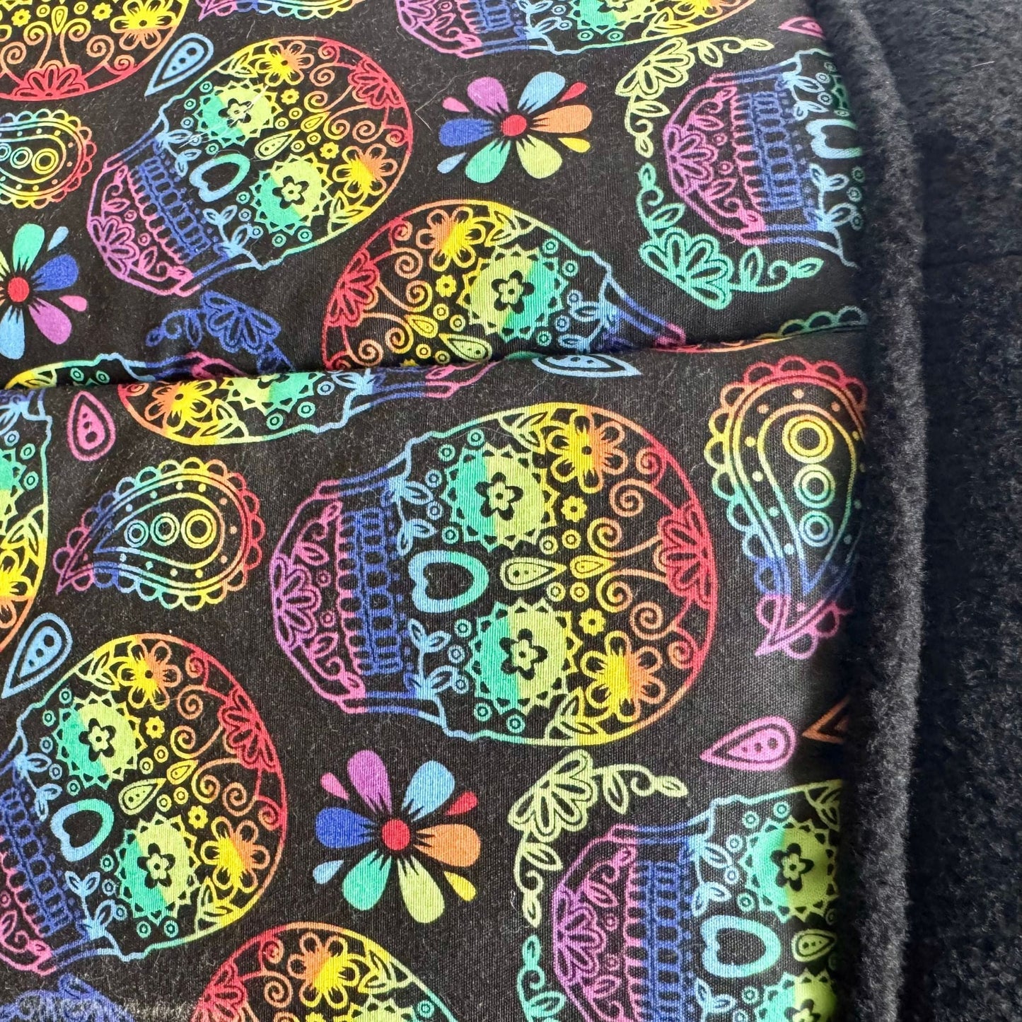 The Frightful Fiesta Fleece Tunnel enchants with neon sugar skulls, swirling midnight paisleys, and gothic blossoms printed on plush fleece. Dramatic, durable stitching adds a touch of handcrafted charm to this goth-glam tunnel—ghostly soft and fully washable for your little familiars’ midnight zoomies and spellbound snuggles. Perfect for guinea pigs or other small creatures seeking cozy comfort in haunting style.