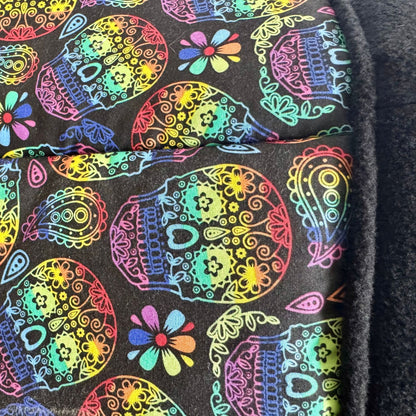 The Frightful Fiesta Fleece Tunnel enchants with neon sugar skulls, swirling midnight paisleys, and gothic blossoms printed on plush fleece. Dramatic, durable stitching adds a touch of handcrafted charm to this goth-glam tunnel—ghostly soft and fully washable for your little familiars’ midnight zoomies and spellbound snuggles. Perfect for guinea pigs or other small creatures seeking cozy comfort in haunting style.