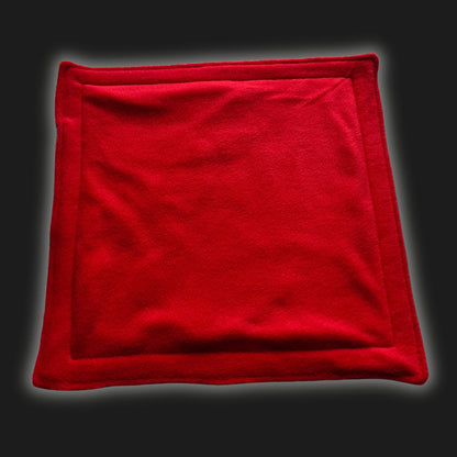 Bewitchingly cozy, the Modular Fleece Liner & Pee Pad appears in a vivid blood-red hue, its plush square form edged with neat, gothic black stitching. Set dramatically against an inky midnight backdrop, this washable fleece pad offers your small pet a soft throne—perfect for hauntingly cute naps and midnight snack sessions.