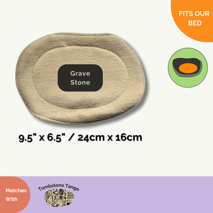 Tombstone Tango Matching Pee Pads—bewitchingly soft, oval-shaped pads (9.5 x 6.5 in / 24 x 16 cm) in cozy beige fleece, each adorned with a charming tombstone motif and pops of playful color. Glamorous yet practical, these odor-resistant pads make clean-up for your cherished guinea pig positively painless (and a touch magical!). Designed to fit most cage setups for stress-free daily use; perfect for gothic-glam small pet havens seeking a dash of the supernatural.