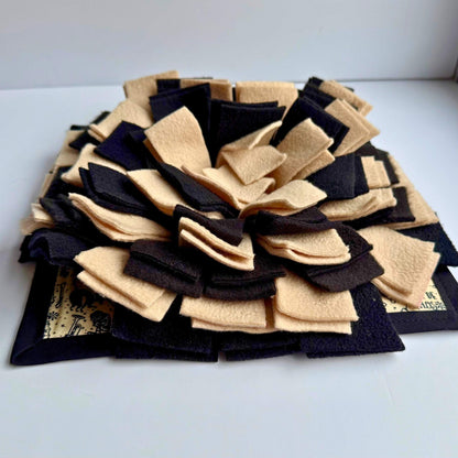 The Tombstone Tango Snuffle Mat blooms with gothic petals of dusky black and bone beige—every nibble a spooky-cute delight.