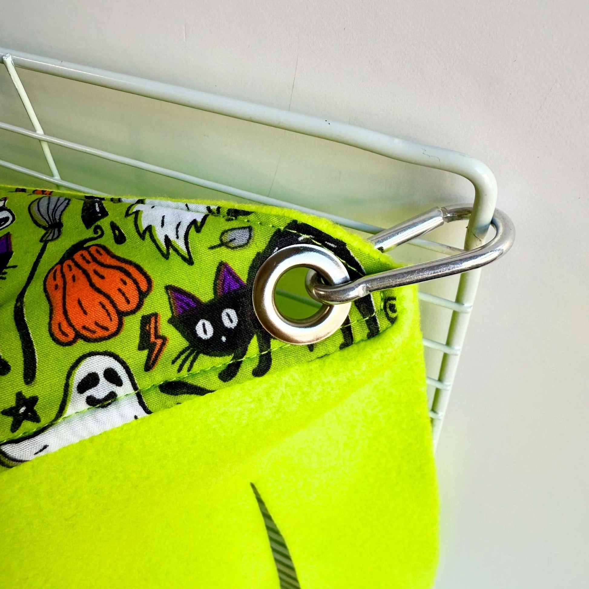 A whimsical peek at Trickster’s Treats Corner Fleece Forest—a cozy yellow hideaway trimmed in spooky-cute green with glam Halloween prints.
