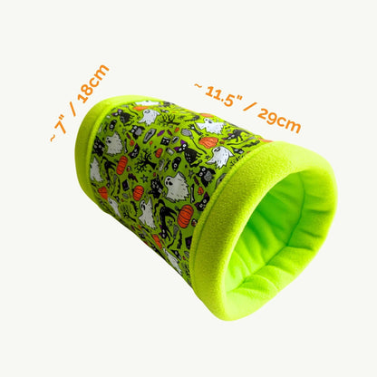 Enchanting bright green fleece tunnel decked in gothic-cute ghosts, bats, and pumpkins—perfect for cozy, spooky guinea pig zooms.